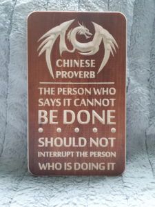 wooden carved chinese proverb sign